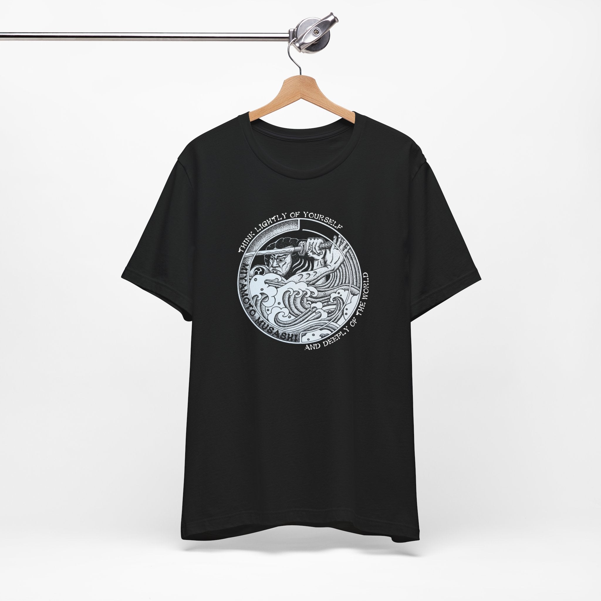 Black Bella Canvas Musashi pointillism tee flat lay — original hand-drawn samurai art by CK Mackie