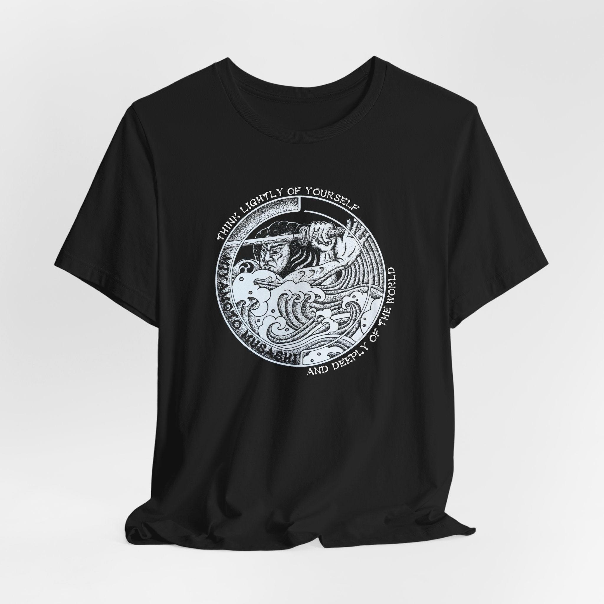 Black Bella Canvas Musashi pointillism tee flat lay — original hand-drawn samurai art by CK Mackie